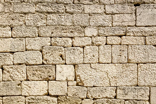 depositphotos_37010813-Ancient-wall-built-of-white-stone.jpg