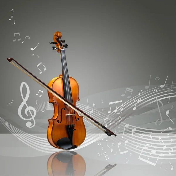 Violin and fiddle stick with musical notes