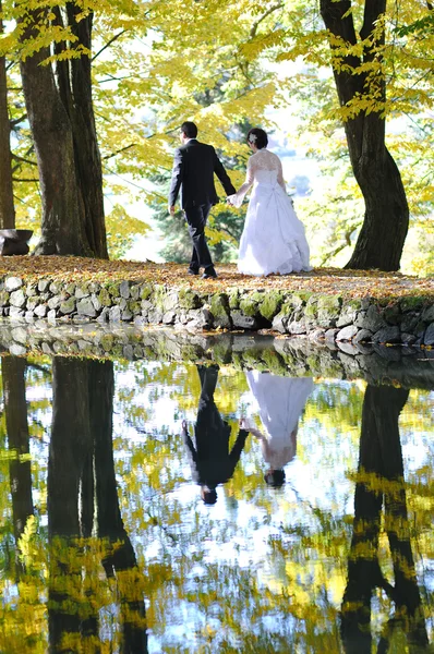 Wedding couple in park