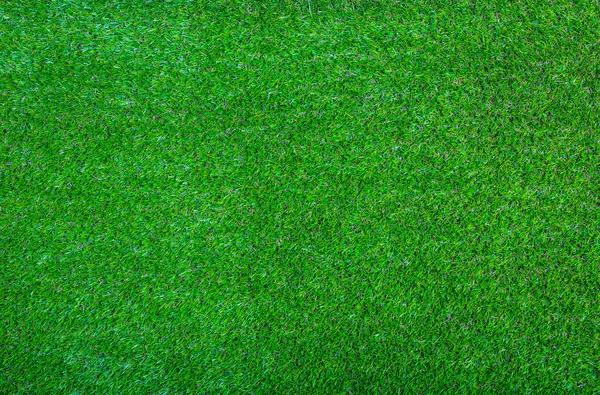 Artificial green grass background texture