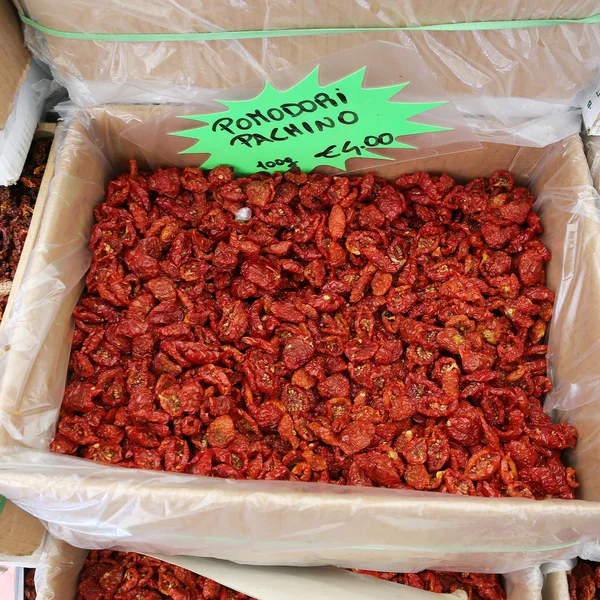 Basket with dried cherry tomatoes in a market in Rome