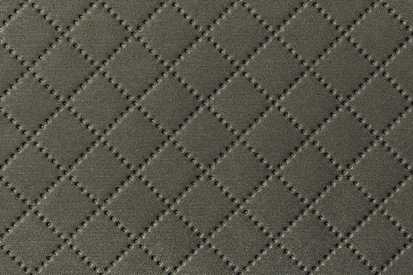 Background of textile texture with diamond pattern decoration
