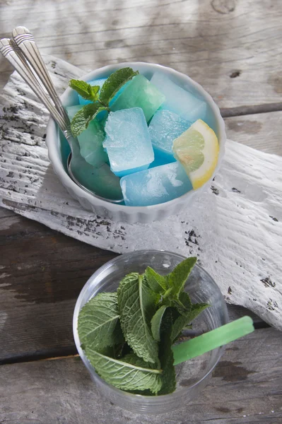 Bowl of colored ice-cubes