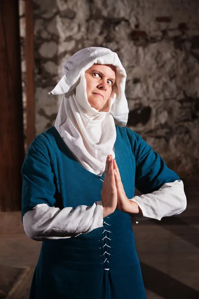 Sinister Nun in Prayer — Stock Photo #23016664