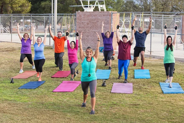 Diverse Group Exercising Outdoors