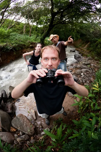 European and American couple with nature guide