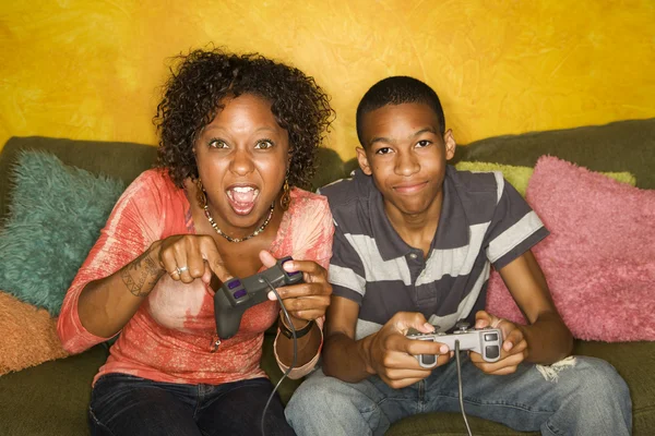 African-American family playing video game