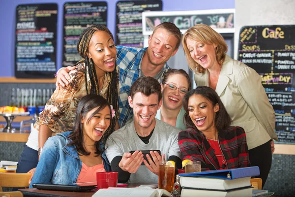 Smiling Students with Camera Phone