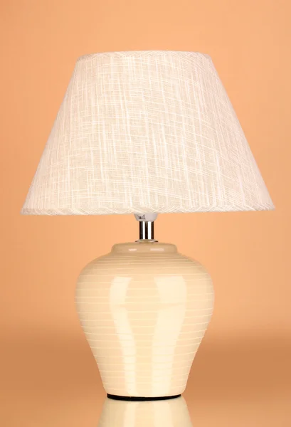 Table lamp on beige background