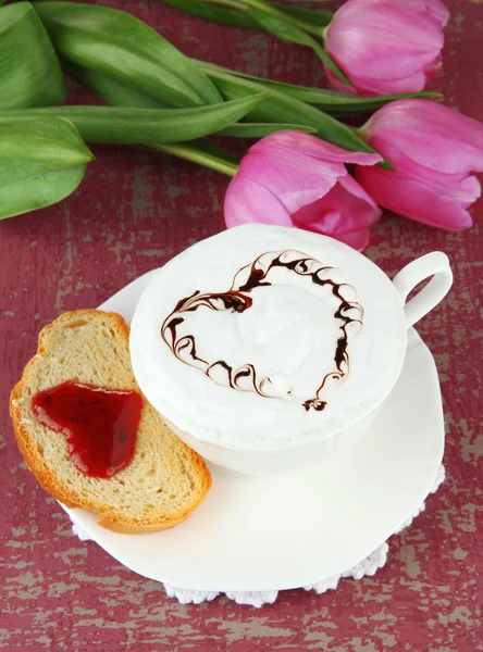 Composition of coffee, toast and tulips on color background