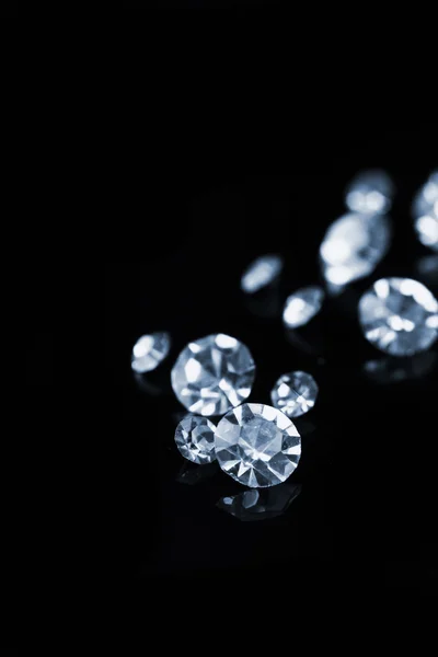 Beautiful shining crystals (diamonds), on black background