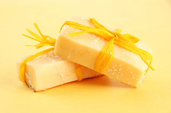 Natural handmade soap, on yellow background