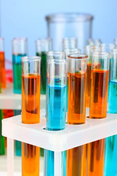 Test-tubes on color background