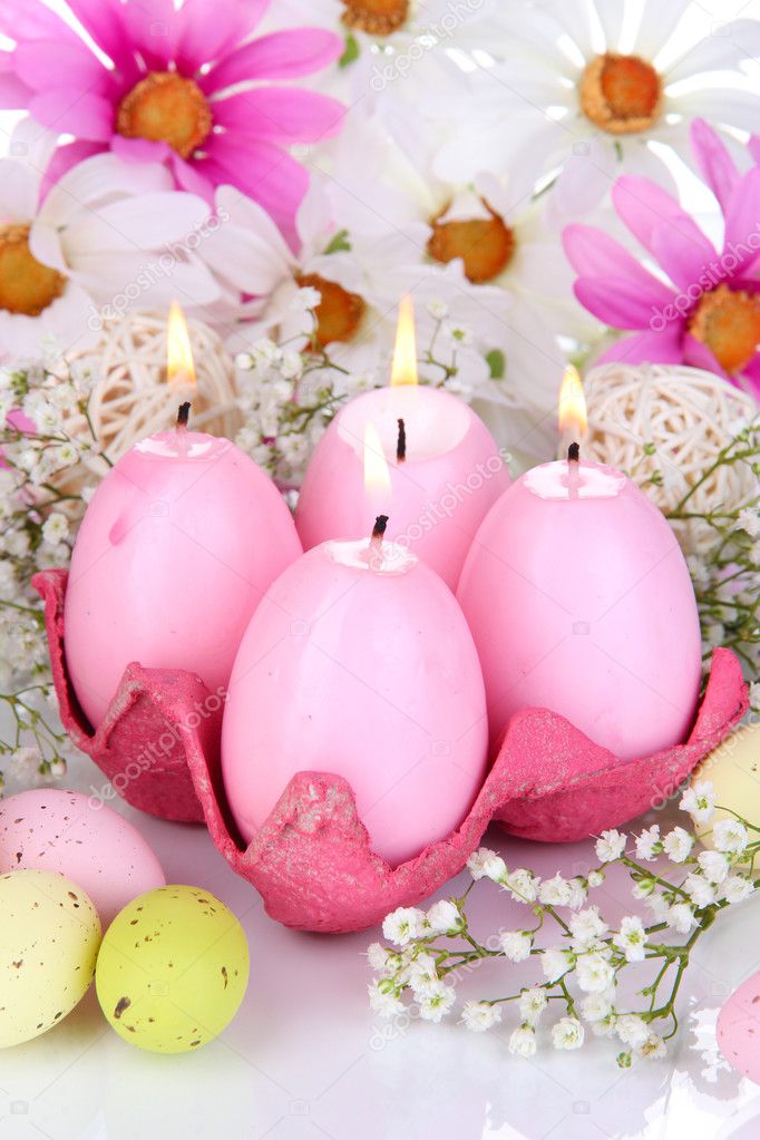 Easter candles with flowers close up — Stock Photo © belchonock 24940543