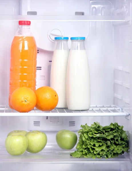 Open refrigerator with vegetarian (diet) food — Stock Photo #27109279