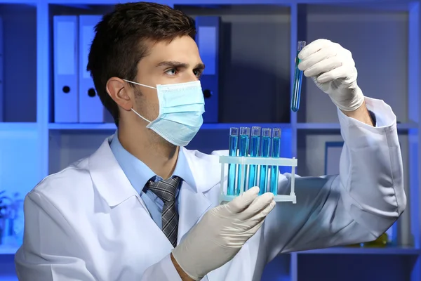 Young laboratory scientist working at lab