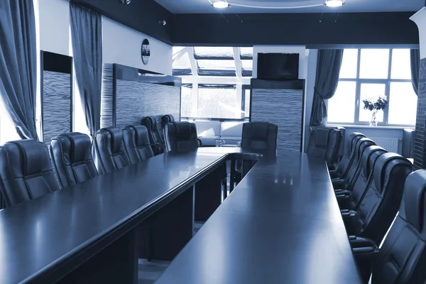 Interior of empty conference room in shades of grey