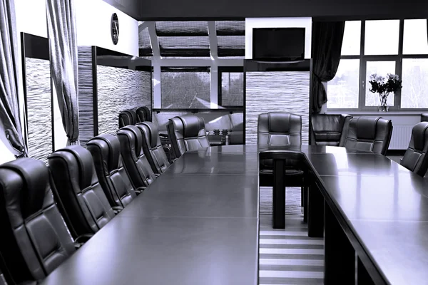 Interior of empty conference room in shades of grey