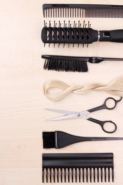 Professional hairdresser tools on table close-up