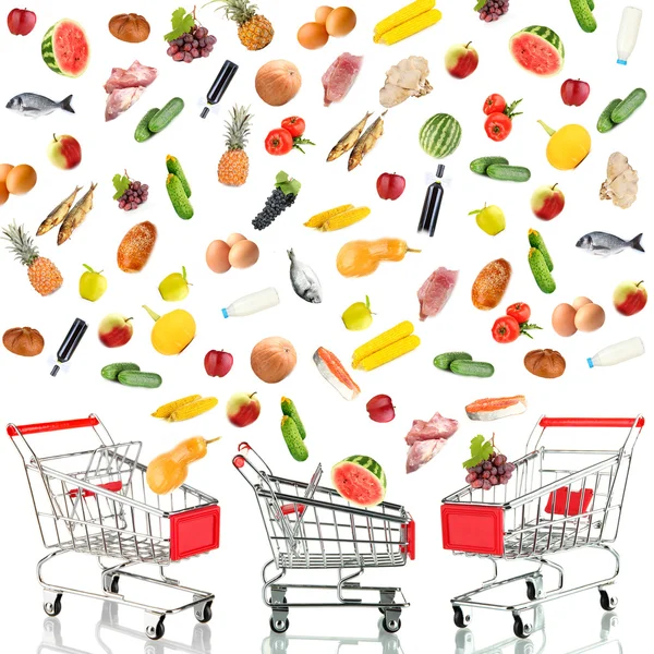Food products flying out around shopping carts isolated on white