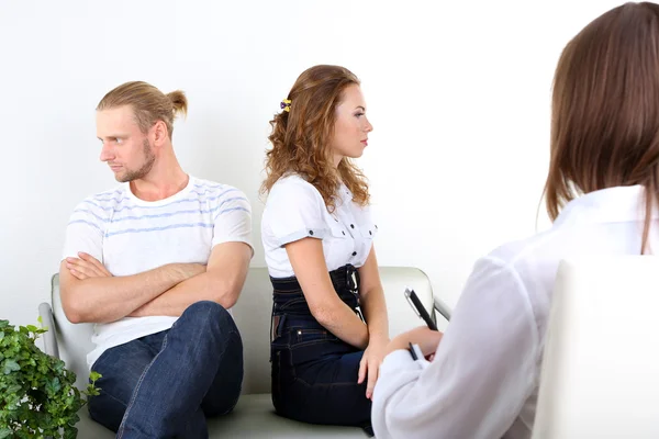 Young couple on reception for psychologist