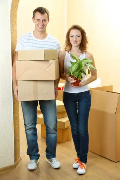 Young couple moves into new home