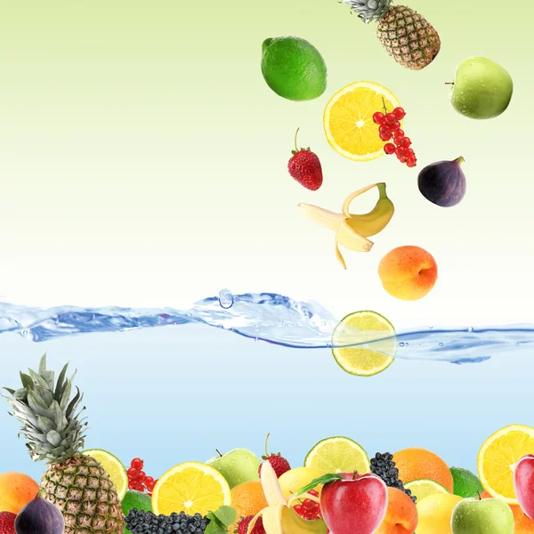 Fresh fruits dropped into water