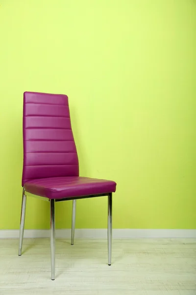 Modern color chair in empty room on wall background