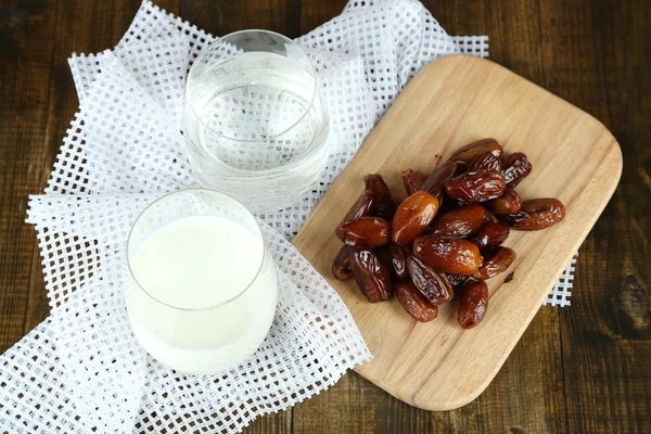 Conceptual photo of Ramadan food:dates palm, milk and water