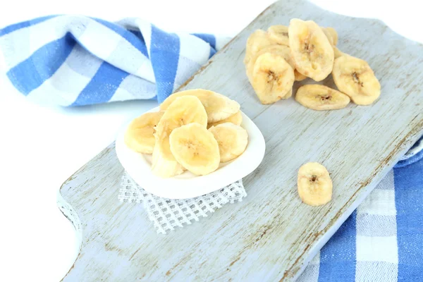 Fresh and dried banana slices, isolated on white