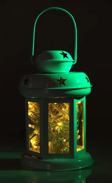 Decorative glowing lantern at night