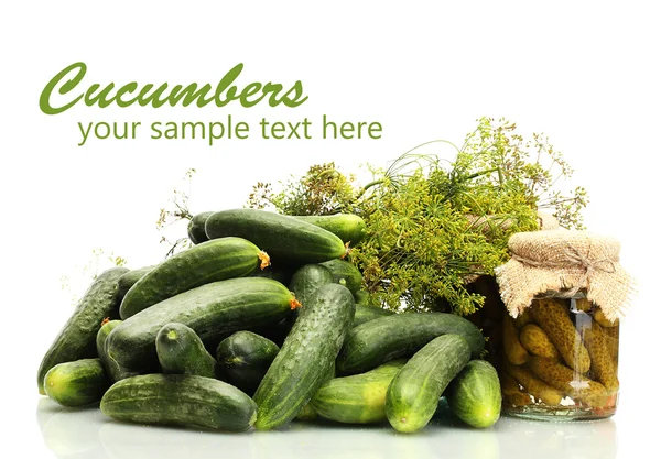 Fresh cucumbers, pickles and dill isolated on white