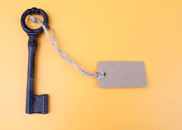 Key with empty tag, on color  background