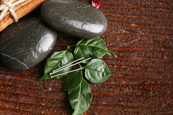 Composition with needles for acupuncture, close up.