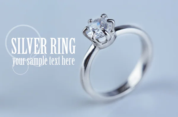 Beautiful diamond ring on light background