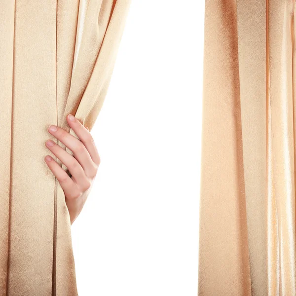 Hand opening curtain on white background