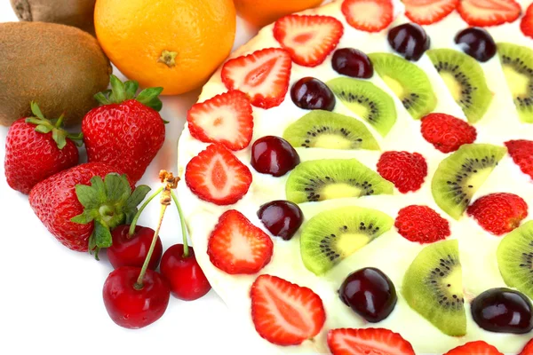 Homemade sweet pizza with fruits, close up