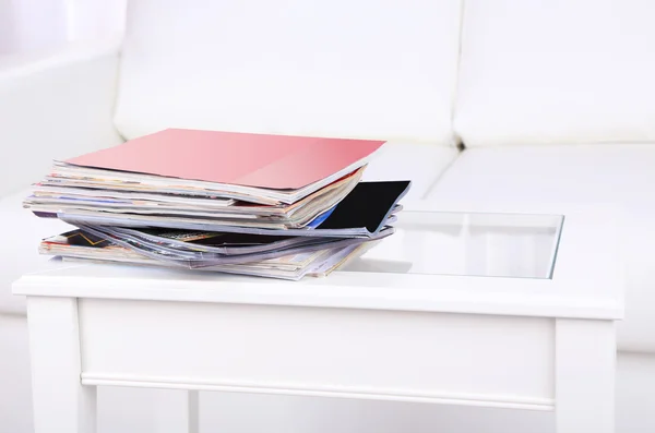 Magazines on coffee table in room