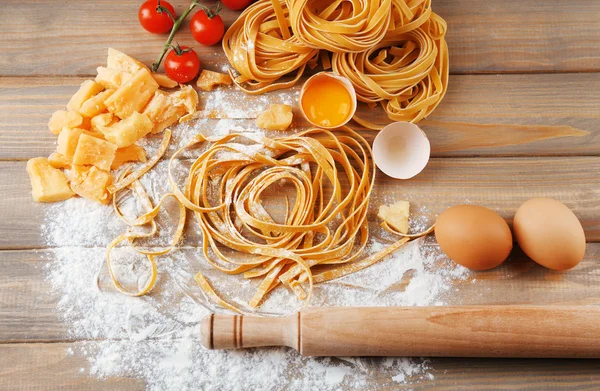 Raw pasta and ingredients for pasta