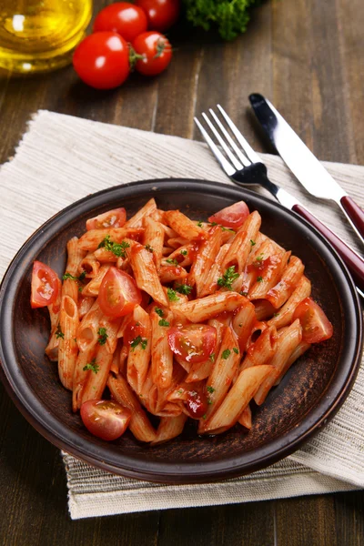 Pasta with tomato sauce on plate