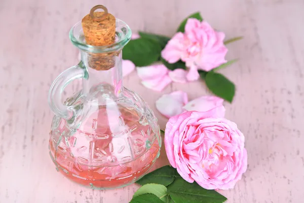 Rose oil in bottle