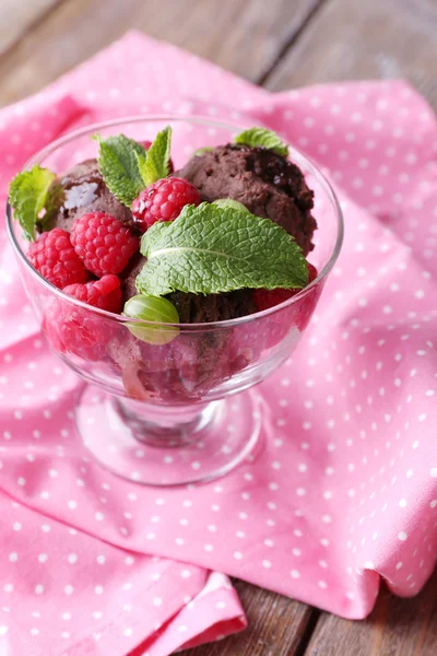 Chocolate ice cream with mint and  berries