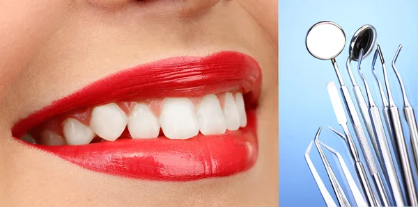 Teeth care concept. Healthy teeth and dental tools.