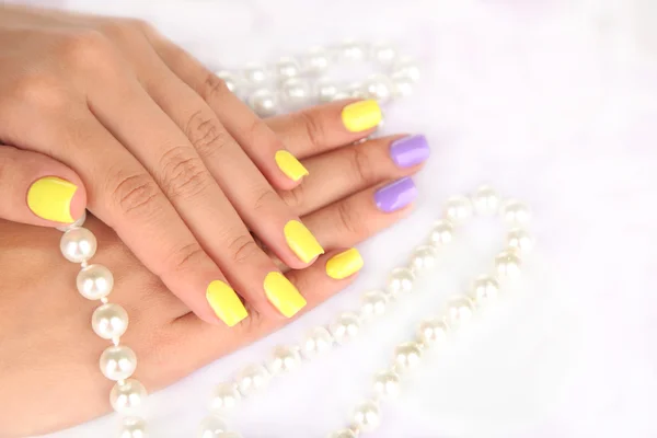 Stylish colorful nails and beads
