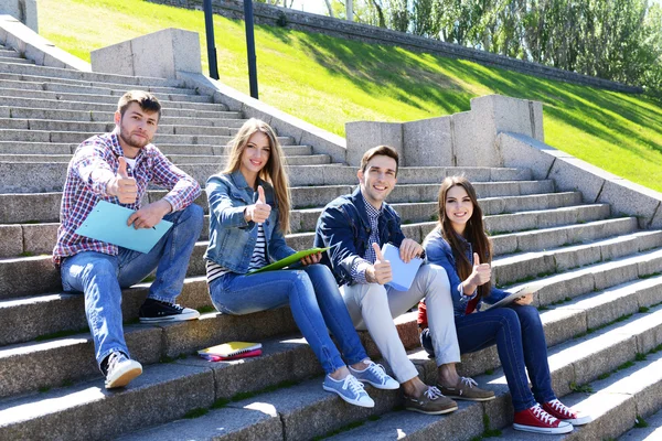 Happy students in park