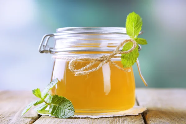 Homemade mint jelly in glass jar
