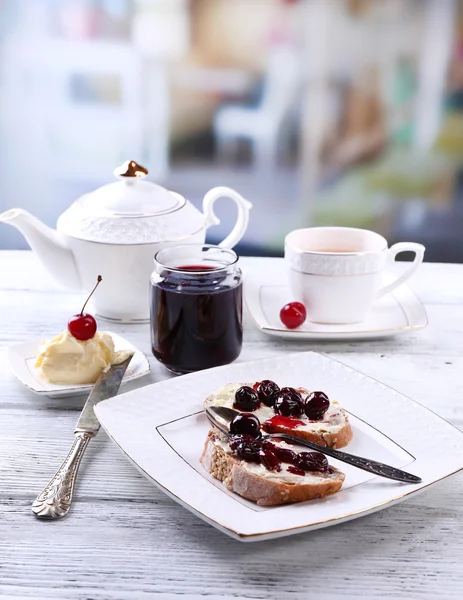 Fresh bread with cherry jam