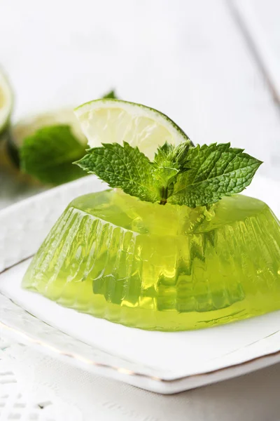 Green jelly with mint leaves