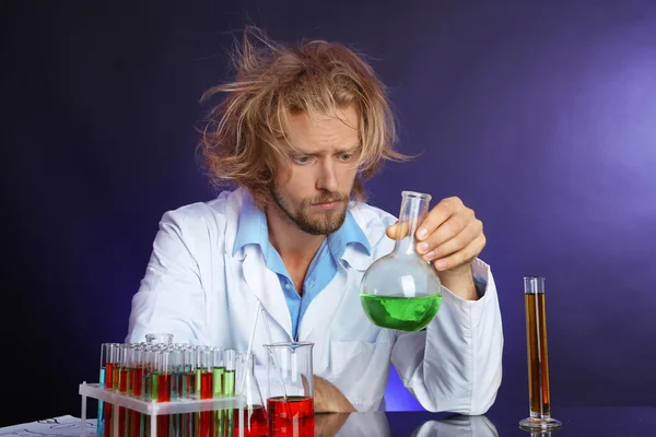 Crazy scientist in laboratory