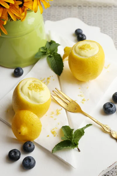 Tasty lemon dessert in lemon peel
